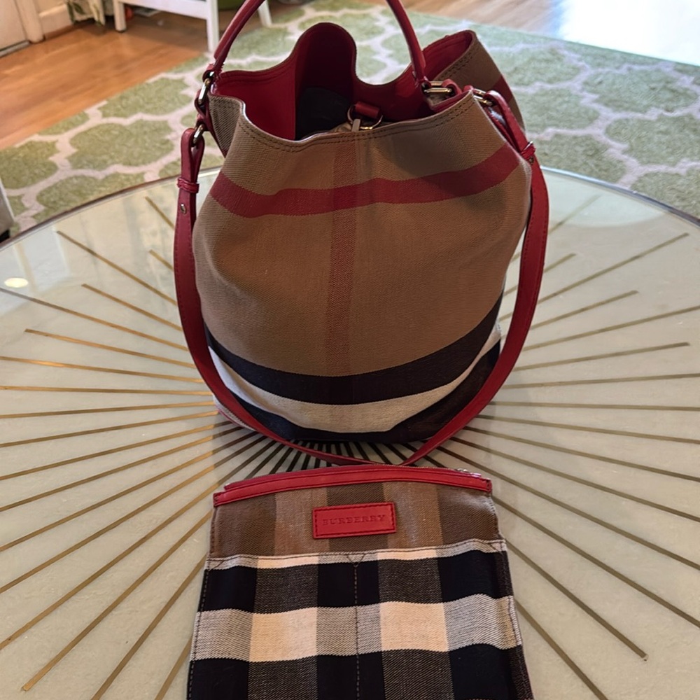 Burberry Ashby bucket bag with red leather.
